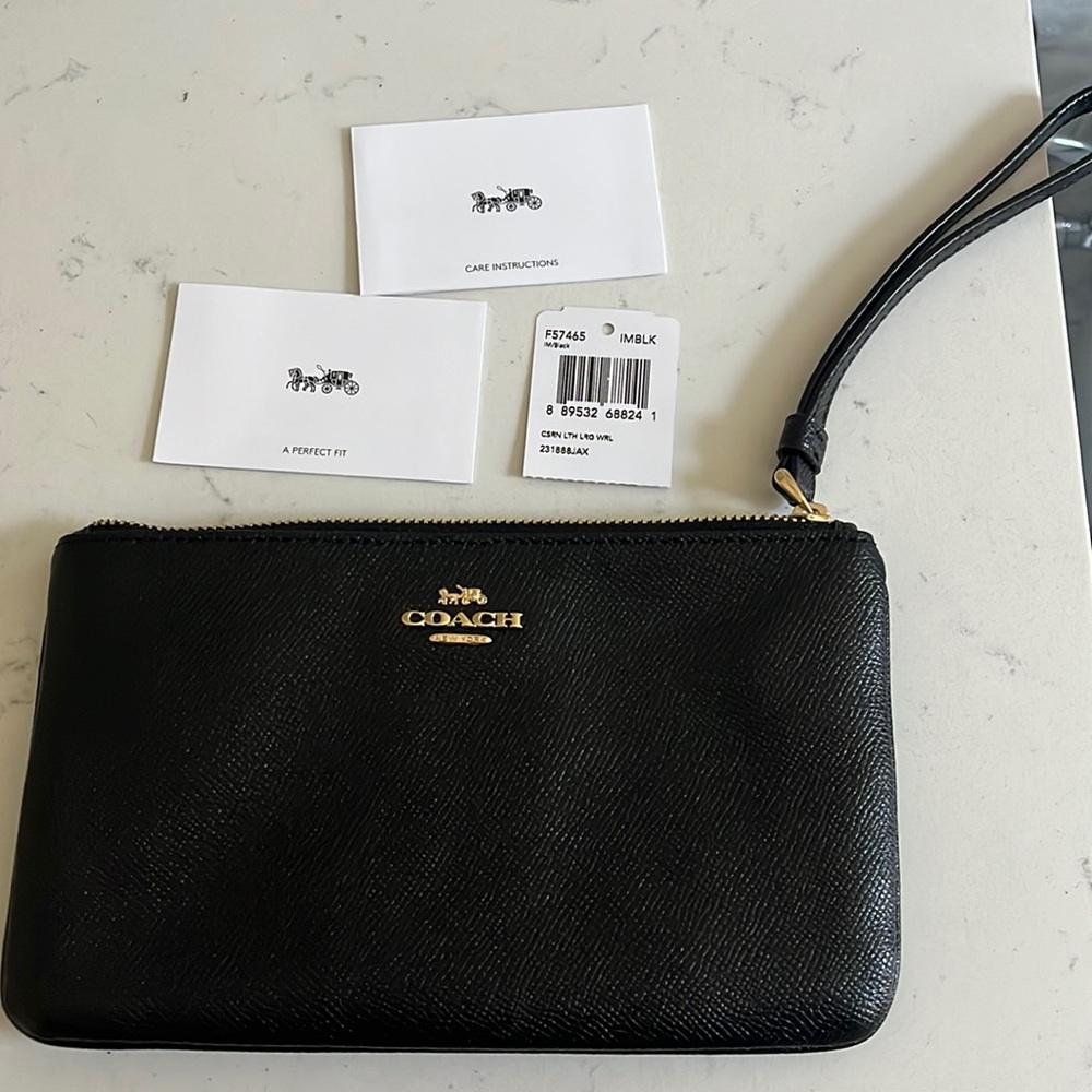 Black Coach Wristlet. Never used